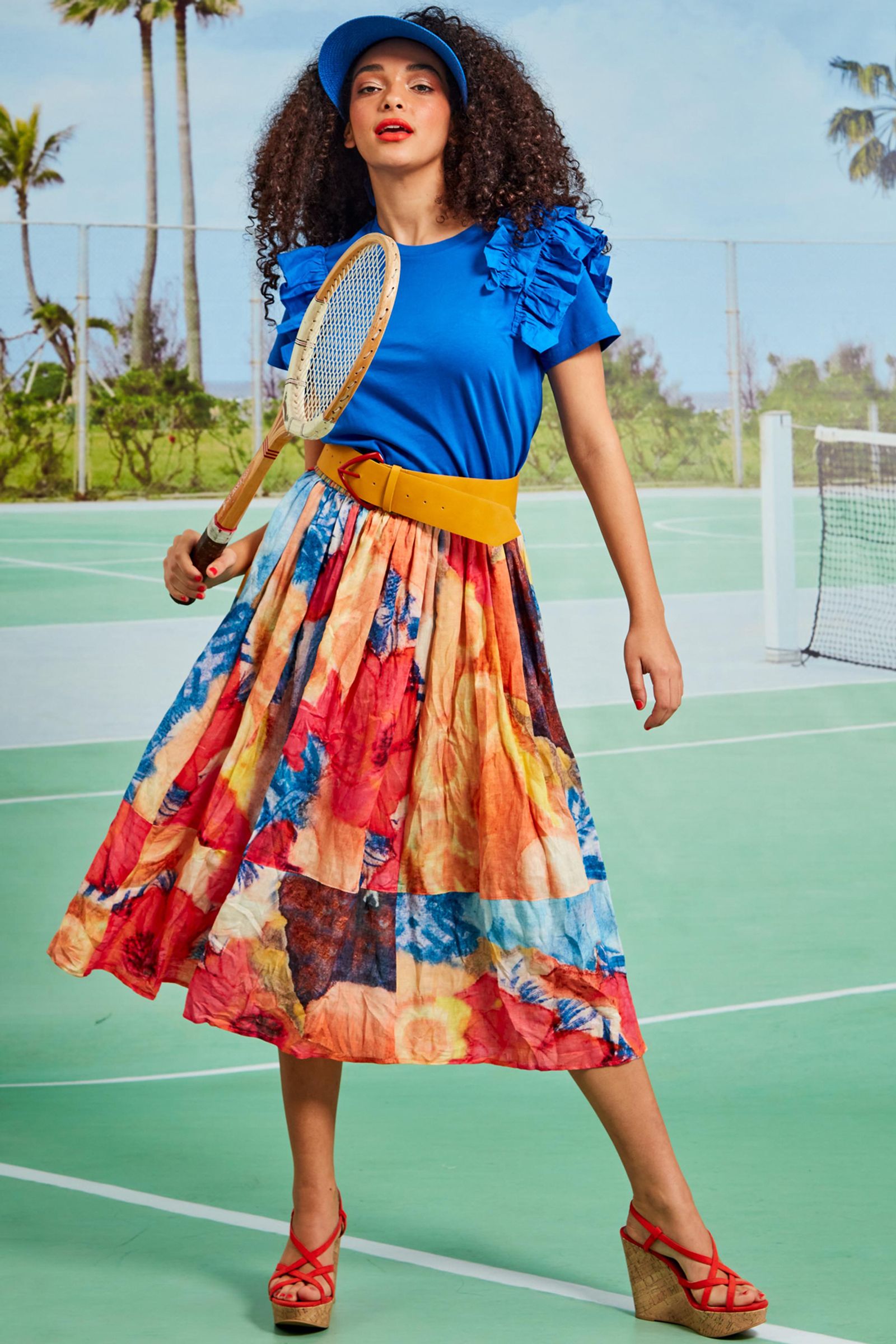 									RIFFLE RUFFLE TOP
								, 			SKIRT OF ART SKIRT
			