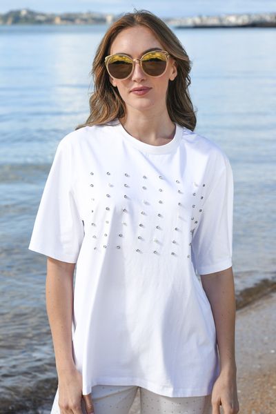 									SURROUNDED BY STUDS TOP
			