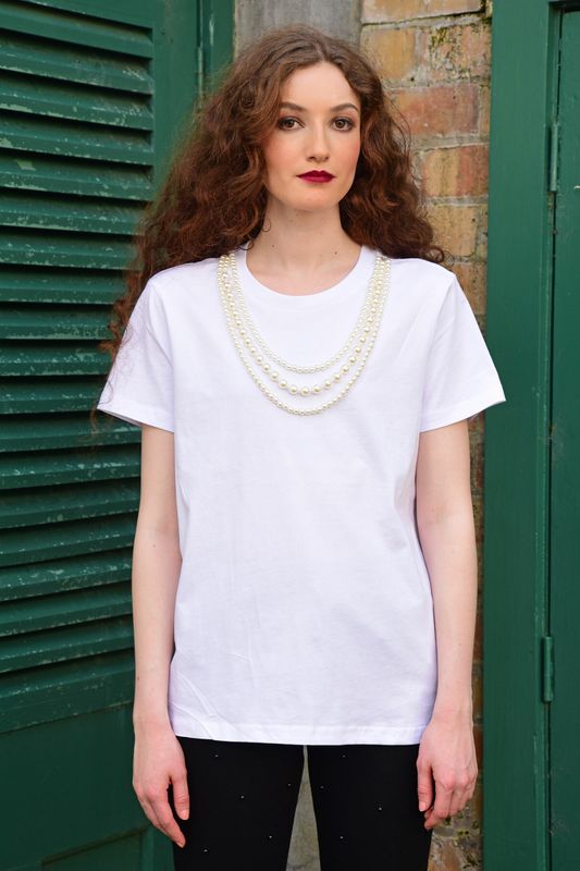 									ABOUT A PEARL T-SHIRT
			