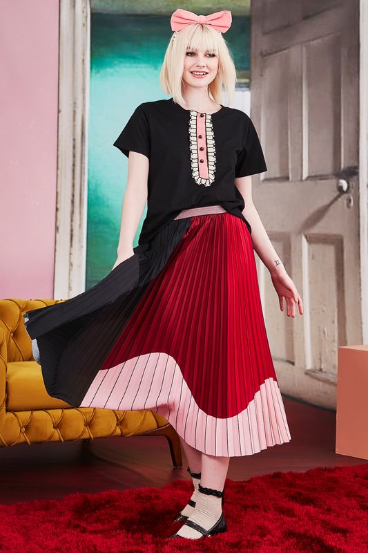 									RUFFLE ALONG TOP
								, 			PLEAT EMOTION SKIRT
			