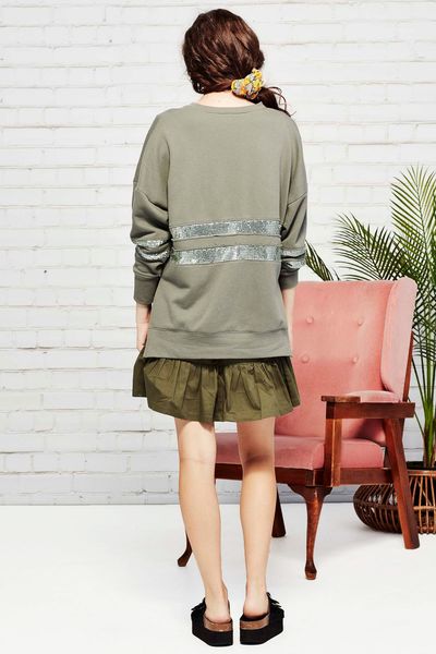 									ARM CANDY TOP
								, 			DR FRILL SKIRT
			