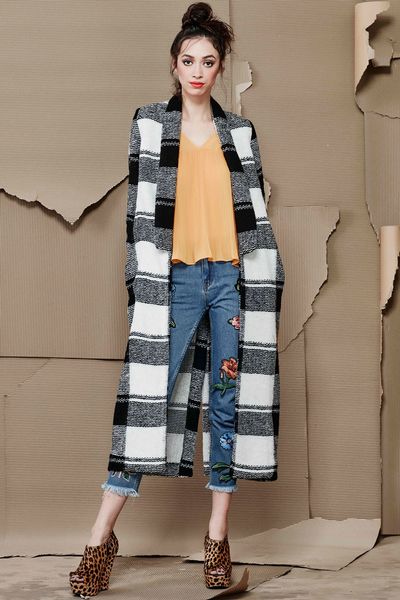 									LAST IN A LONG LINE COAT
								, 			BETWEEN THE PLEATS TOP
								, 			GOODBYE NORMAL JEANS
			