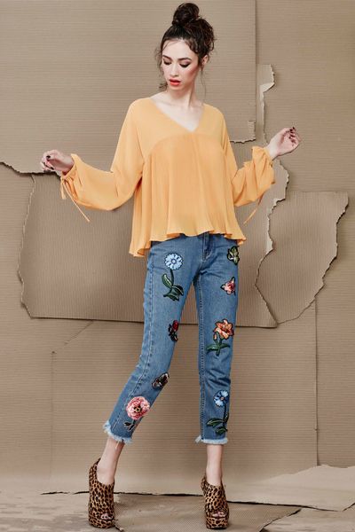 									BETWEEN THE PLEATS TOP
								, 			GOODBYE NORMAL JEANS
			