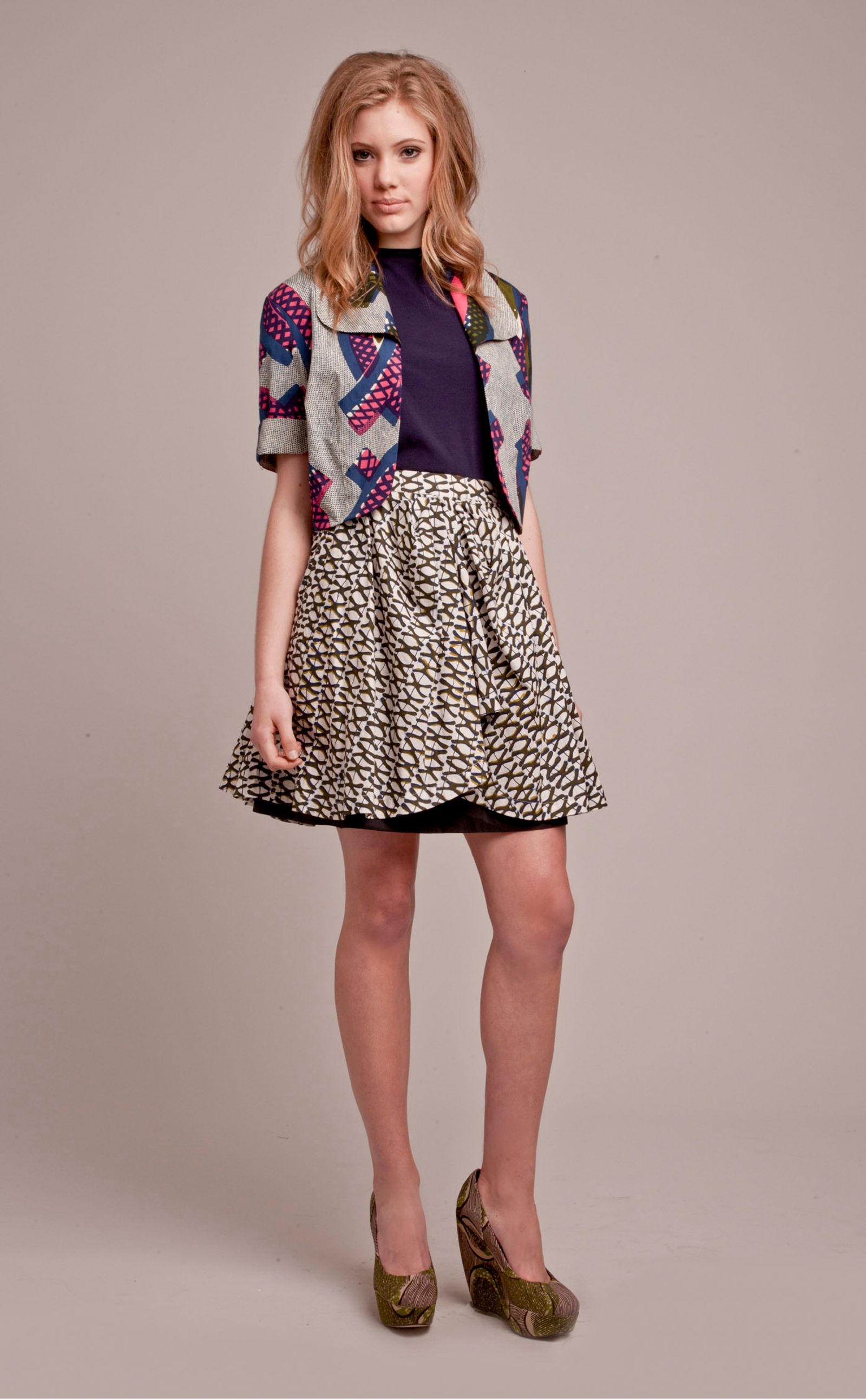 									African Beat 'Tribe and True' jacket
								, 			Resort 'Free and Easy' top
								, 			(worn backwards)
			