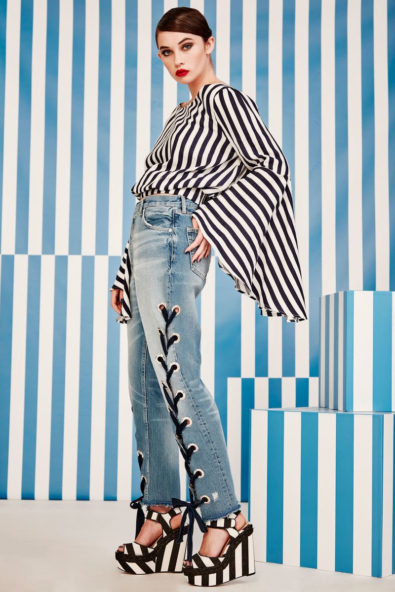 									STRUNG UP JEANS
								, 			WORN WITH FLARE TOP
			