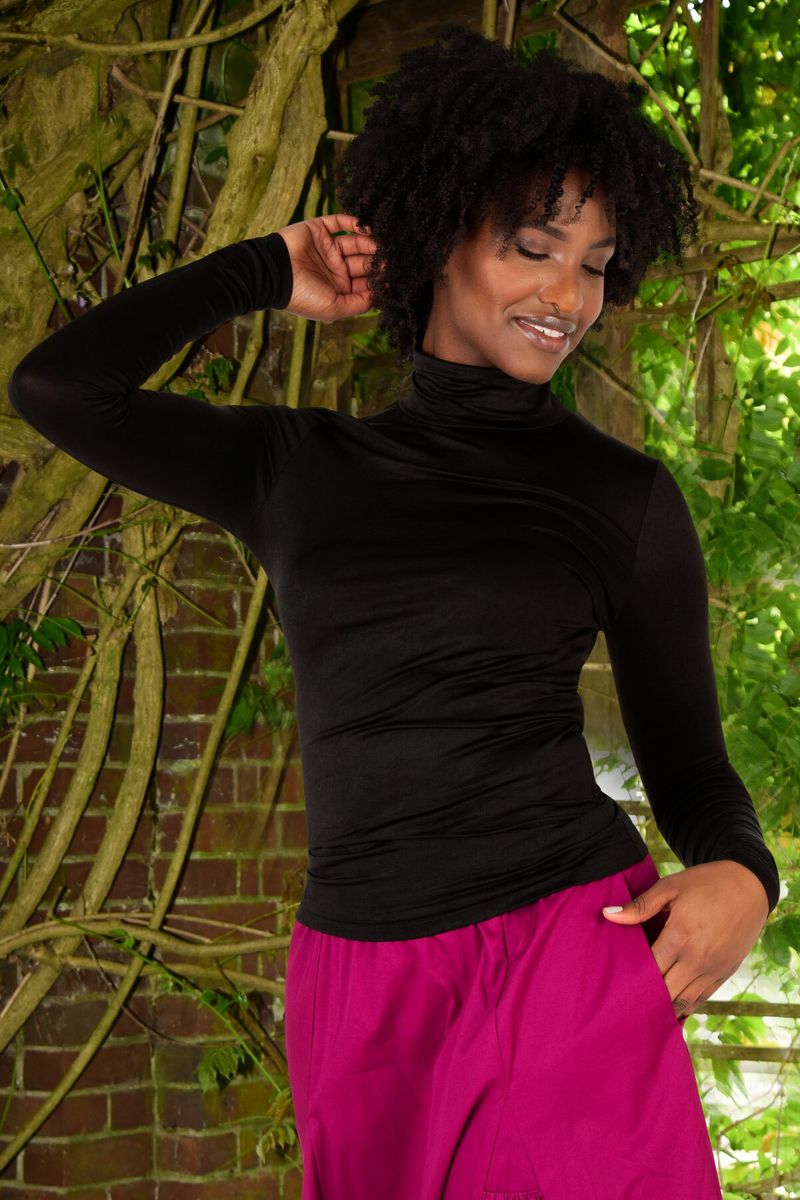 									NECK OF THE WOODS TOP
			