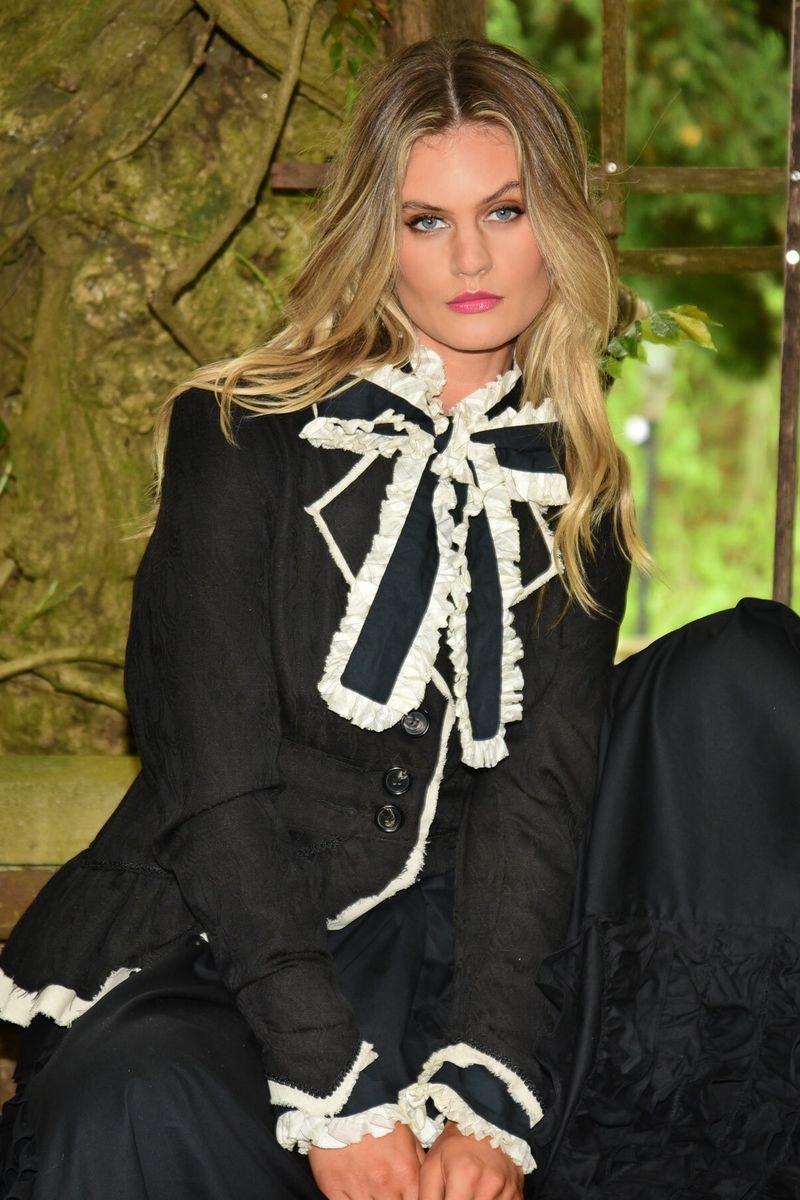 									PRIM AND PROPER JACKET
			