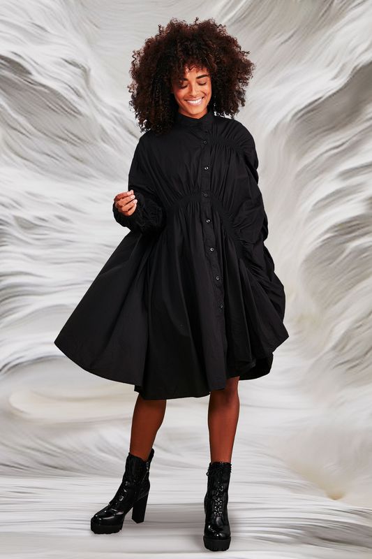 									IN A MAD ROUCHE DRESS
			