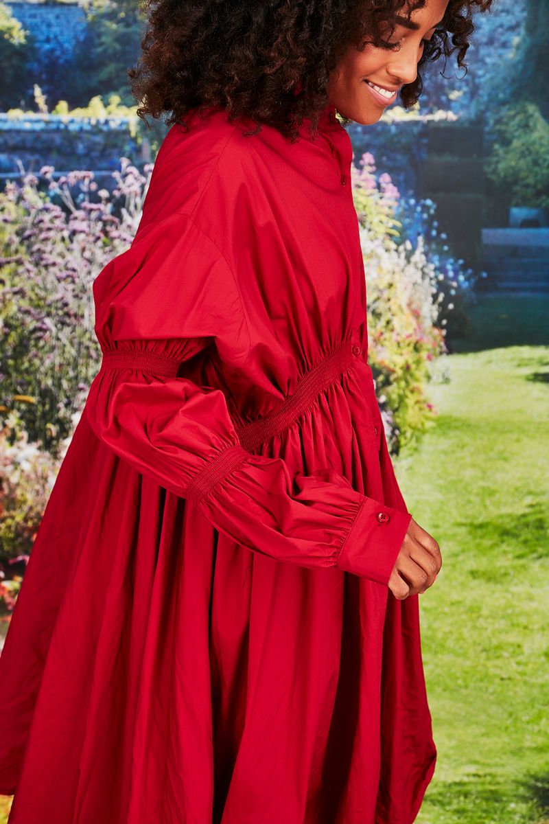 									IN A MAD ROUCHE DRESS
			