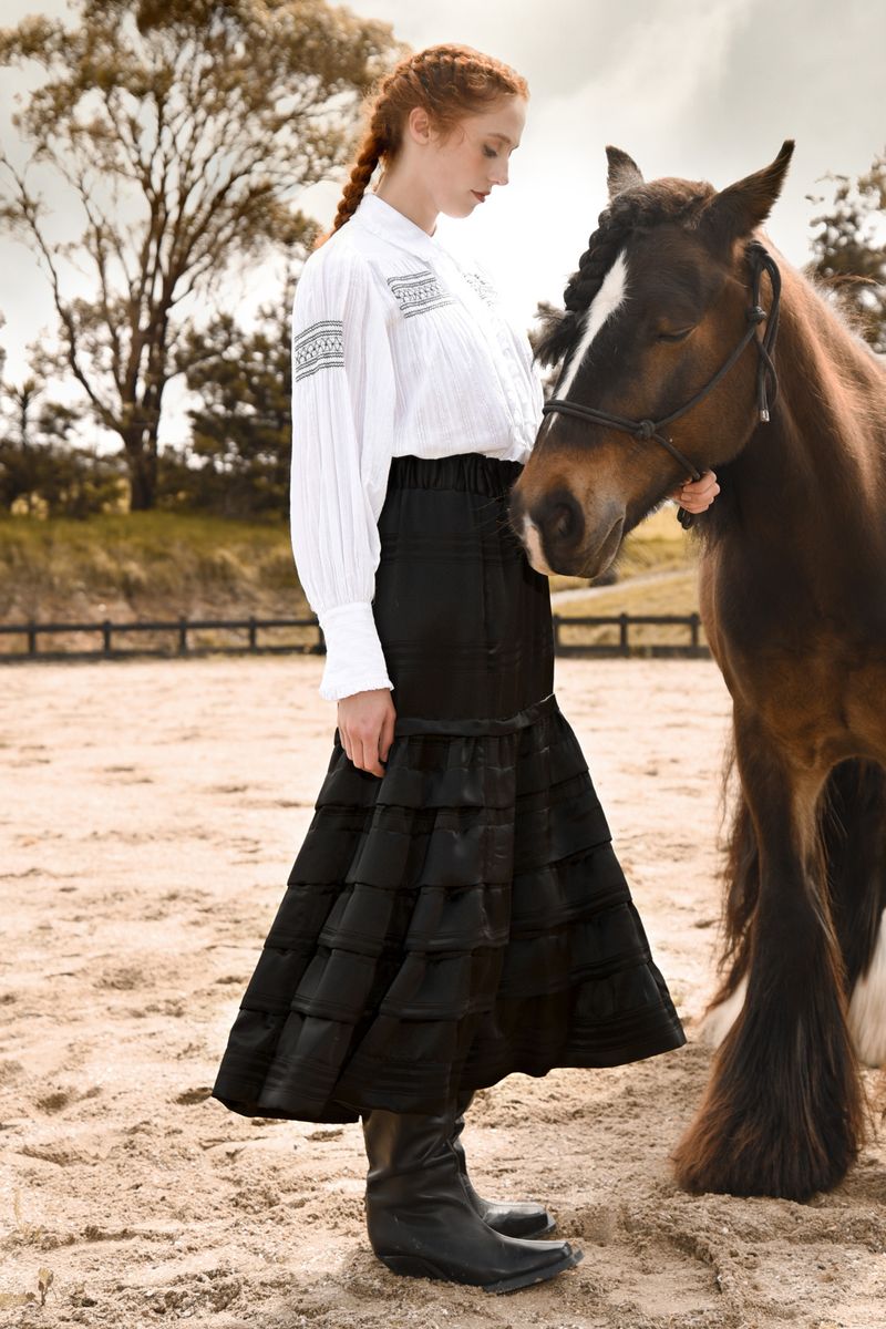 									LET THE PLEAT DROP SKIRT
			