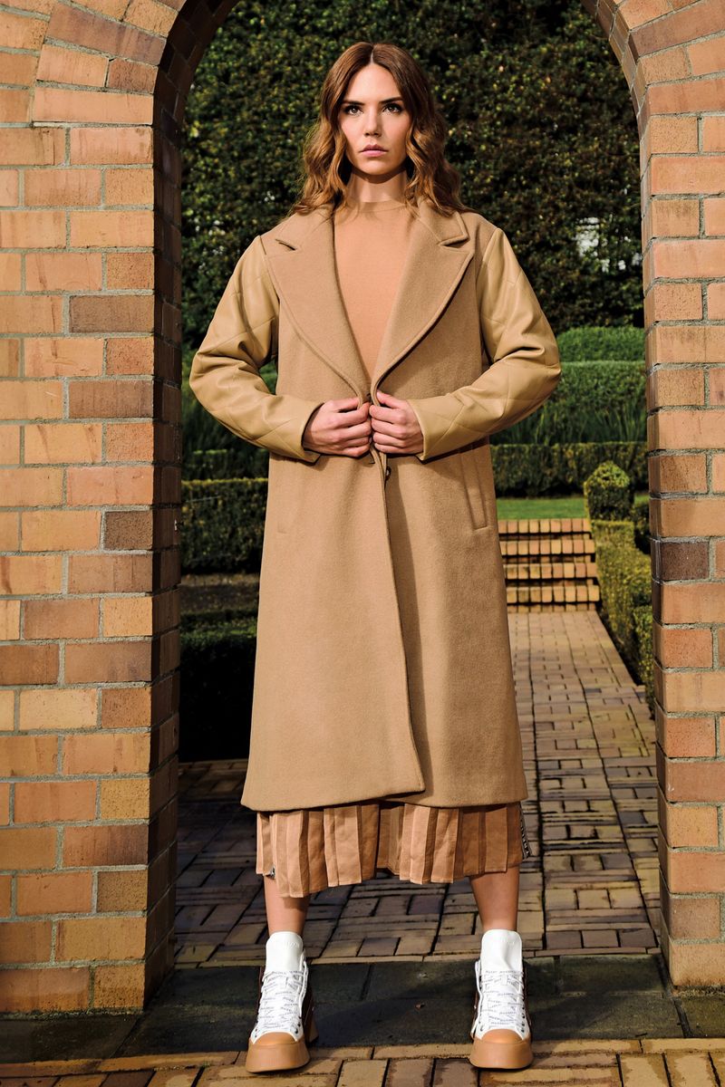 									WE QUILT THIS CITY COAT
			