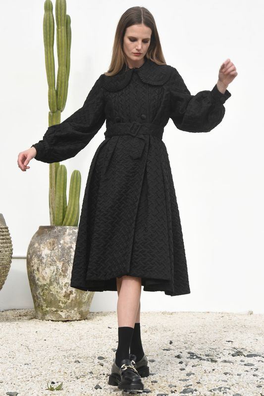 									POWER & PURPOSE COAT
			