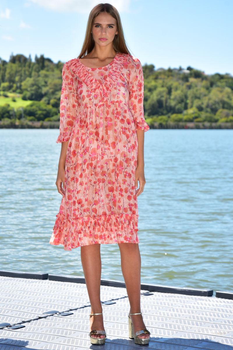 									RUFFLE SHUFFLE TUNIC
			