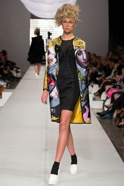 									FACE OFF 'DAYLIGHT FACING TIME' COAT
								, 			SNAKECHARMER 'KICK UP YOUR ASP' DRESS
			