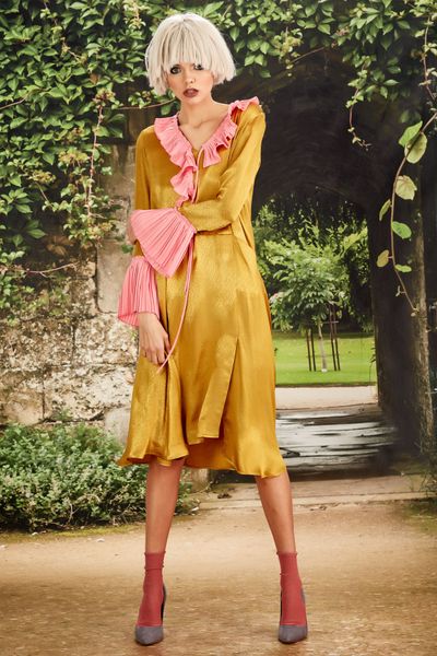 									IN THE PLEAT OF THE NIGHT DRESS
			