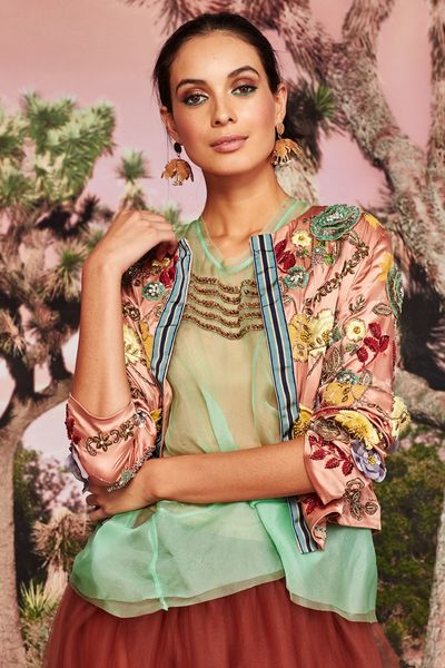 									DRAPED IN JEWELS JACKET
								, 			STORY OF SHEER TOP
								, 			TULLISE SKIRT
			