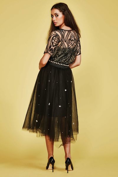 									PIN UP SWIRL TOP
								, 			MUCH TU TU ABOUT NOTHING SKIRT
			